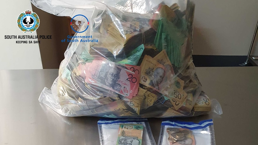 Almost a million dollars in cash, drugs found police in Adelaide hotel room - ABC News