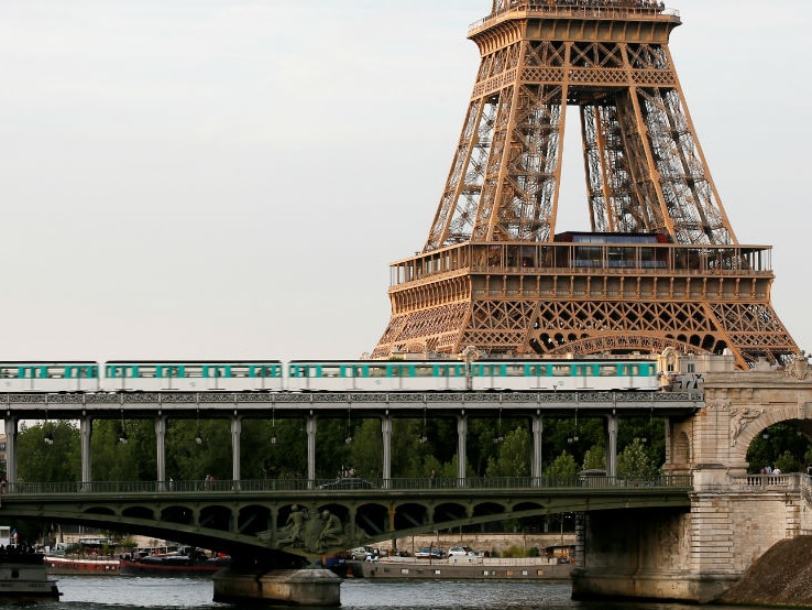 Paris Metro goes past the Eiffel Tower