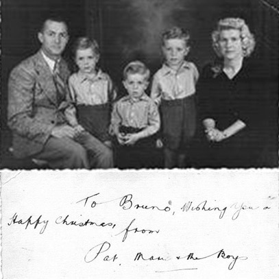A black-and-white image of a family and a Christmas message