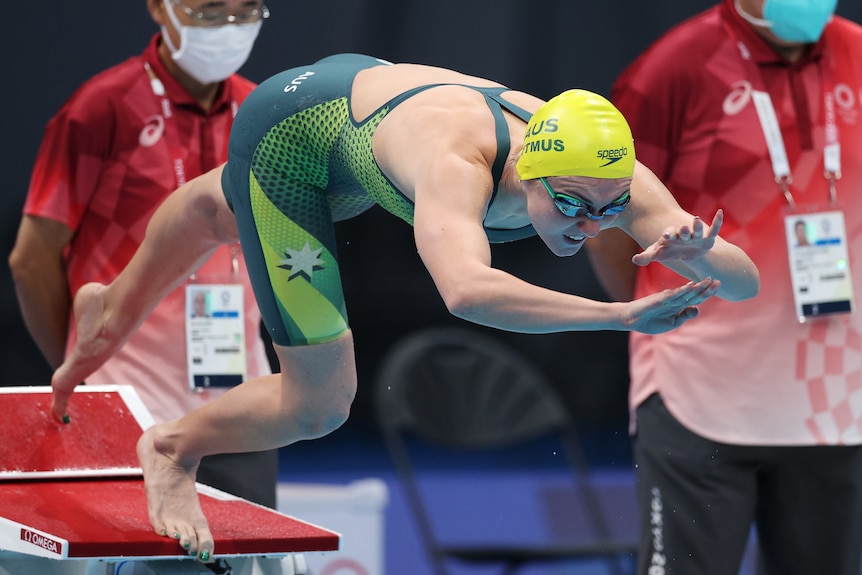 Ariarne Titmus dives off the start blocks for her 200m freestyle heat at the Tokyo Olympics.
