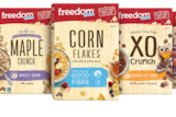 A row of five cereal boxes including Rice Puffs and Maple Cruch, manufactured by Freedom Foods.