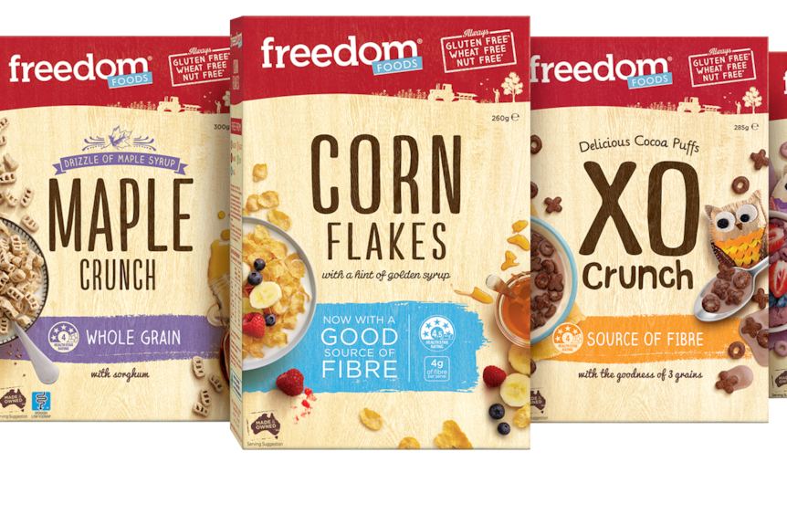 A row of five cereal boxes including Rice Puffs and Maple Cruch, manufactured by Freedom Foods.