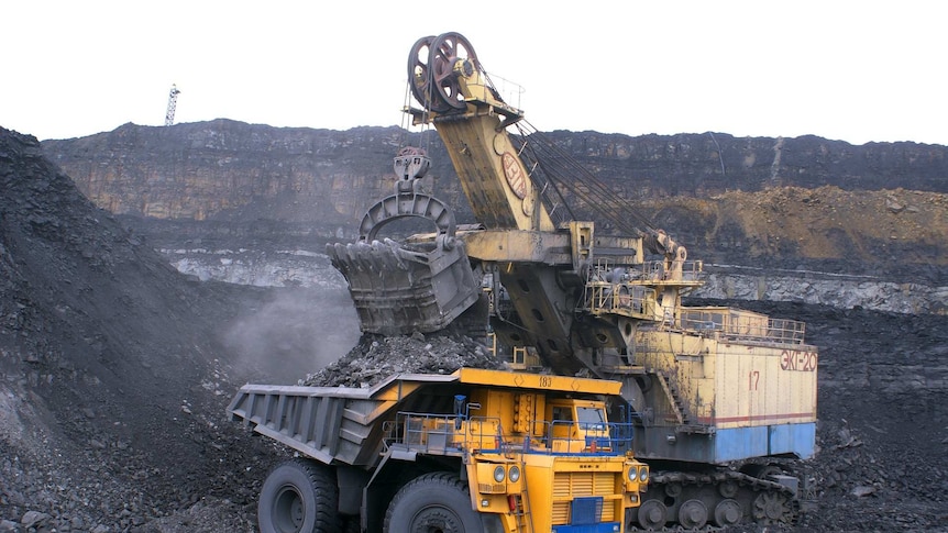 Machines working in coal mine