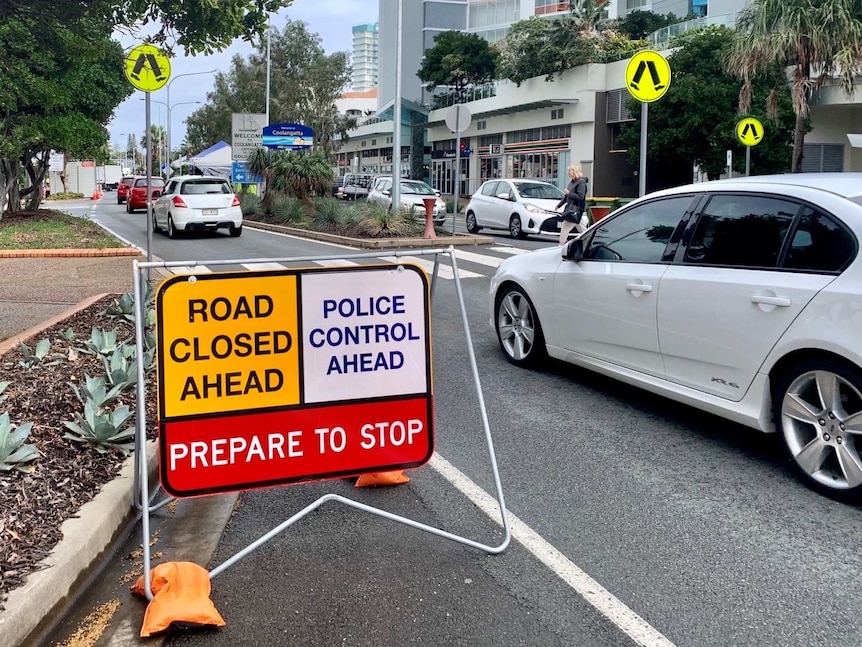 A road closure sign on the Queensland-New South Wales border.