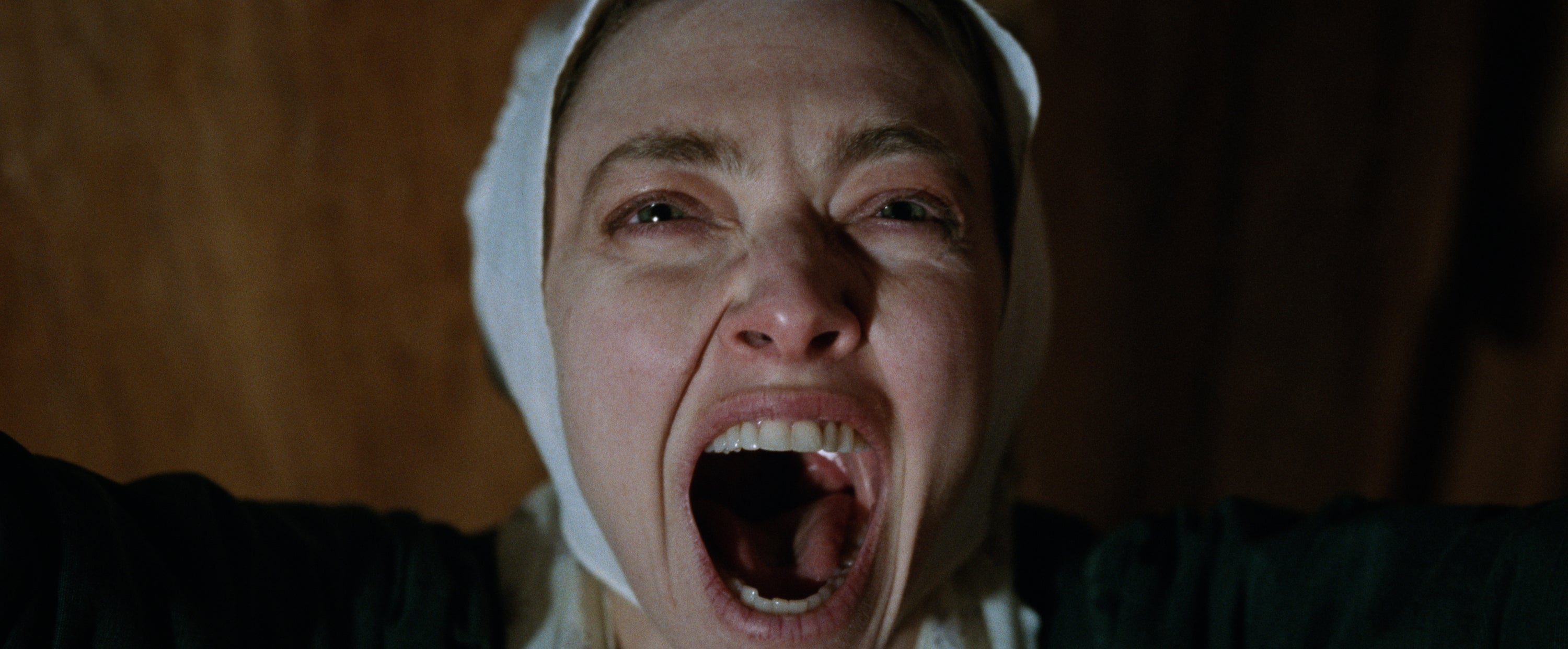 Close up of woman's face as she screams