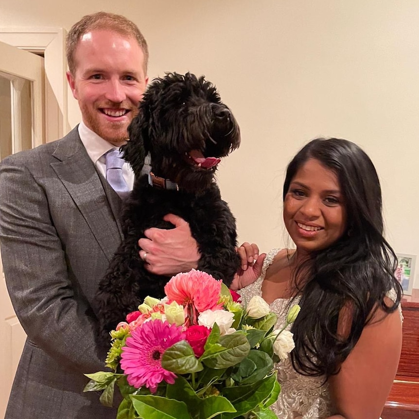 Newly weds Ben Sturm and Sari Krishnan at their wedding ahead of South Australia's strict November lockdown.