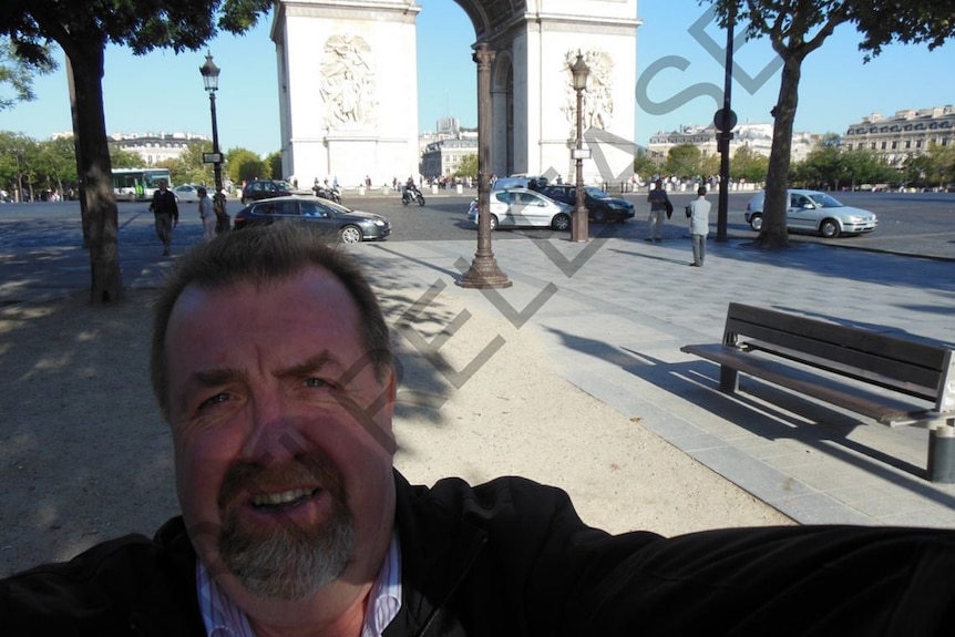 Paul Tully takes a selfie at Champs Elysses in Paris in 2012.