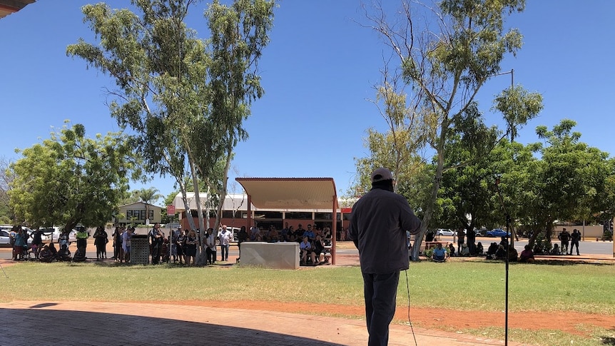 A speaker addresses a crowd during a protest at Tennant Creek.