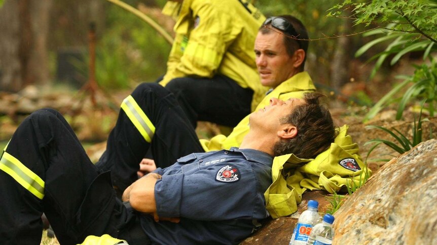 Firefighters take a break at Faulconbridge in the Blue Mountains