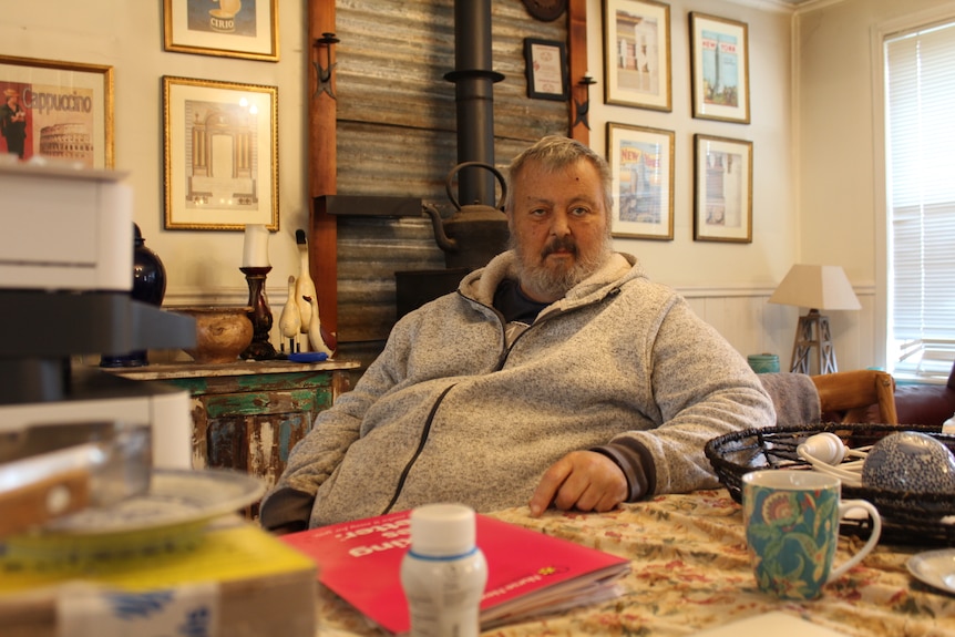 Man sits at a table