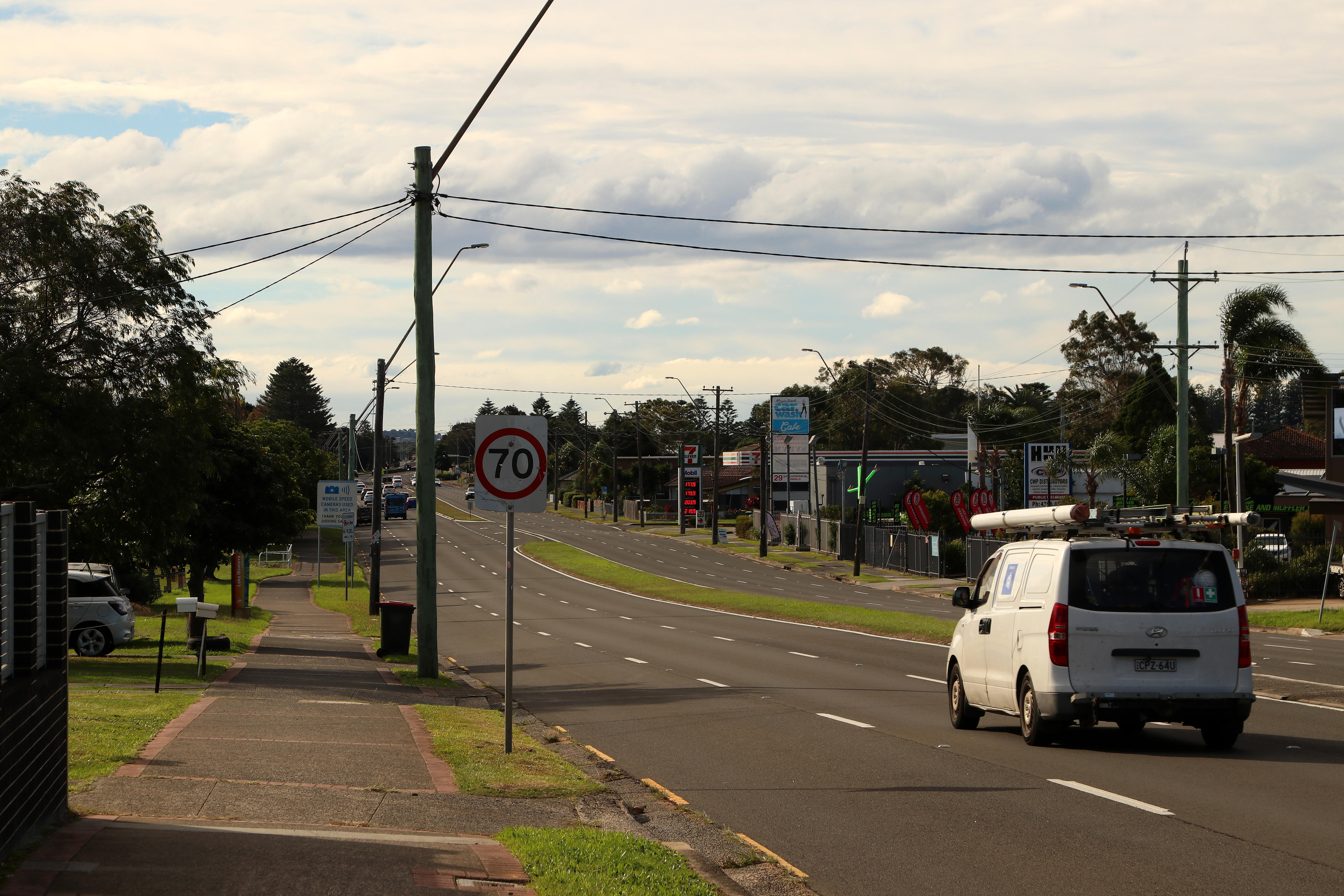 A main road with a median strip down the middle.