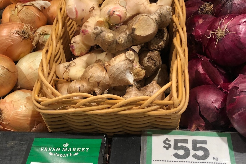 Ginger in a basket priced at $55/kg.