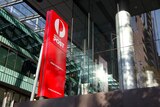 A red sign showing the white Australia Post logo indicates that there is a post office 50 meters away on Bourke Street.