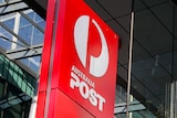 A red sign showing the white Australia Post logo indicates that there is a post office 50 meters away on Bourke Street.