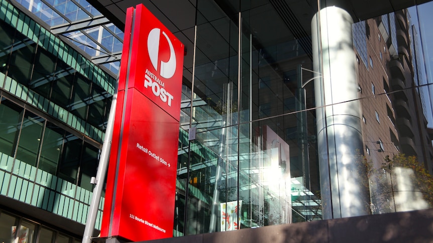 A red sign showing the white Australia Post logo indicates that there is a post office 50 meters away on Bourke Street.