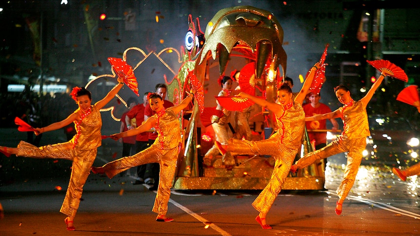 Dancers make their way along the parade route during Chinese New Year celebrations in Sydney.