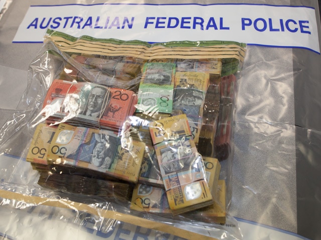 Police seized around $230,000 in cash from a 43-year-old Dunlop man's car.