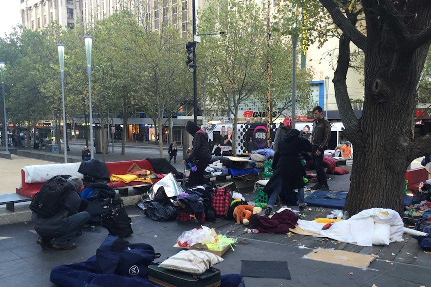 Homeless protesters pack up their camp site at City Square
