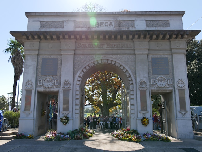 Anzac Day memorial with wreaths at the bottom.