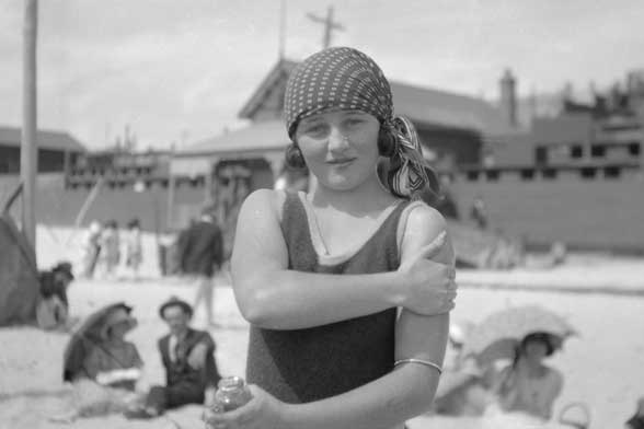 Applying lotion at Cottesloe Beach, 1923.