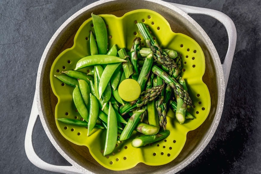 Green vegies in steamer