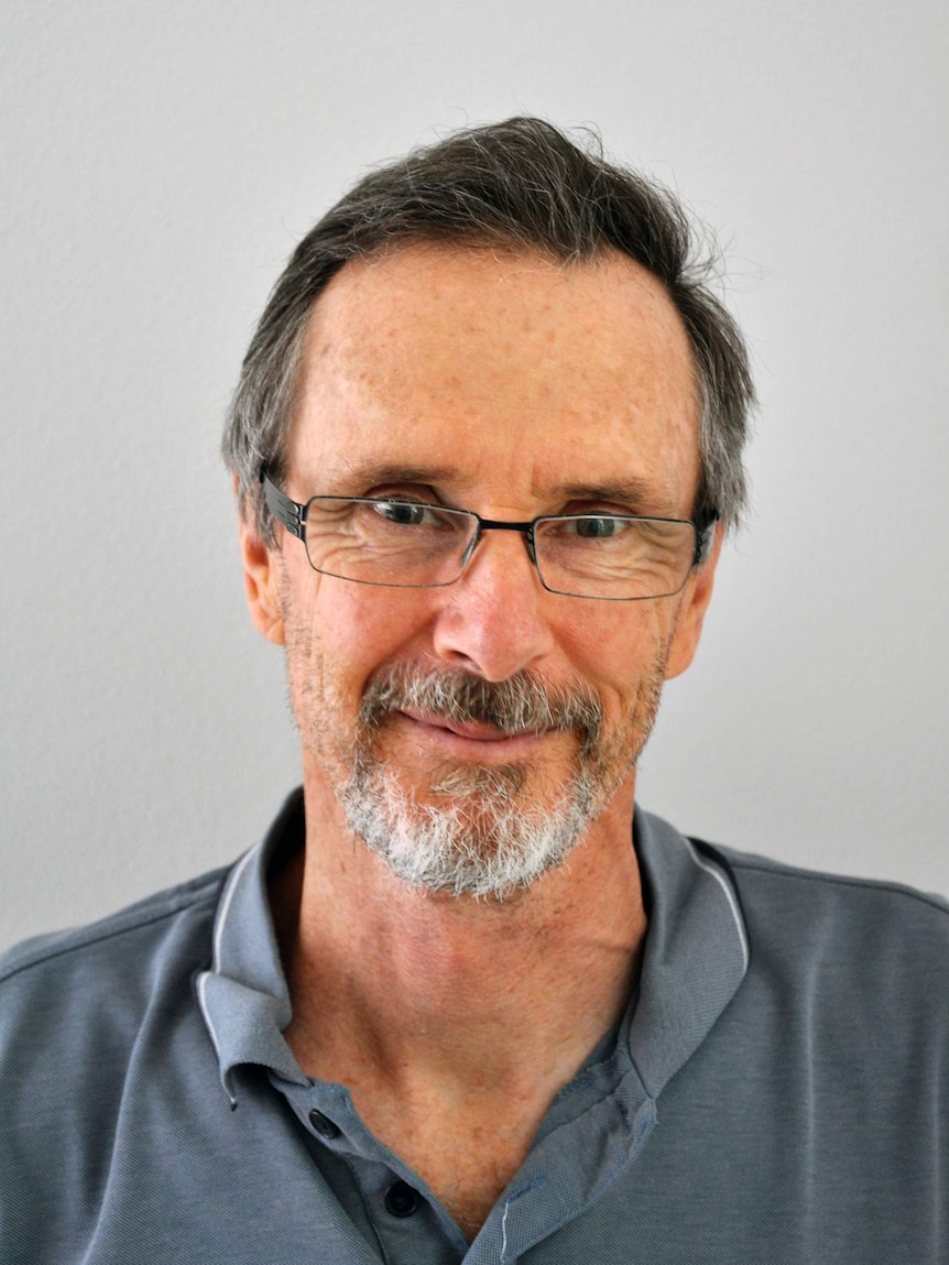 Headshot of Tony Naar, smiling into camera.