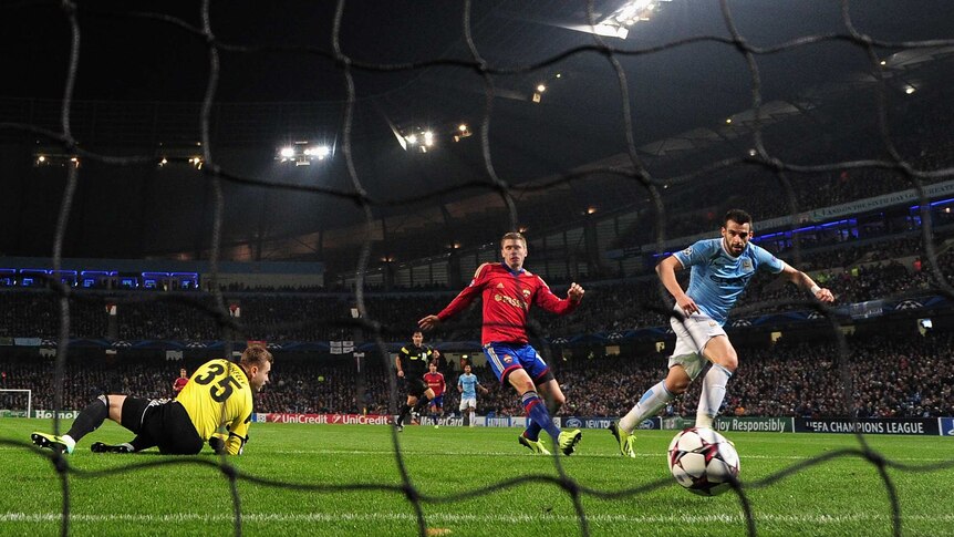 Alvaro Negredo scores Manchester City's third goal against CSKA Moscow in the Champions League.
