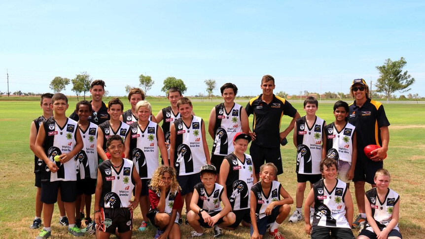 AFL workshops in remote areas are aimed at helping boost kids' confidence.