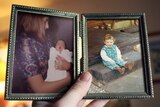 Two photos of a young girl and a little baby being cradled by a woman in a photo frame.