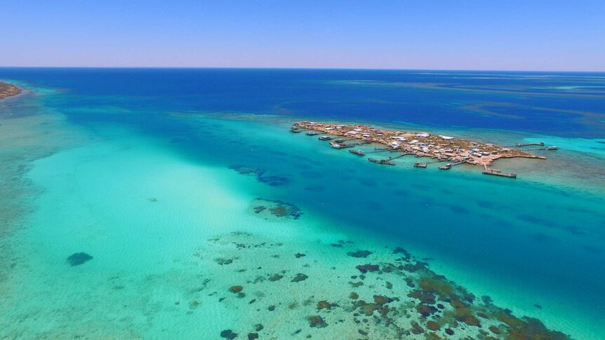 A photo taken from the air of Houtman Abrolhos, an island chain off the coast of WA