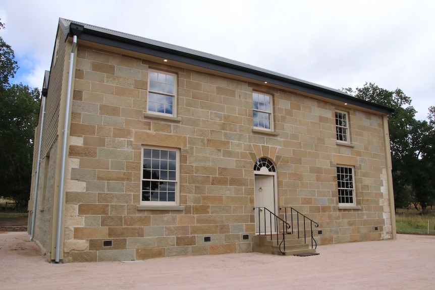 A sandstone building.