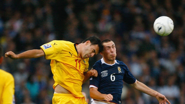 Maiden point: Scott Brown headed Scotland into the lead with his first international goal.