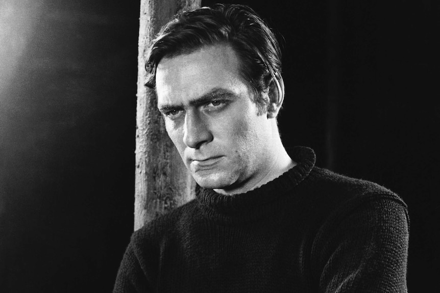 Christopher Plummer wears a black jumper and looks moody while playing the role of Satan in the play "J.B." in 1959.