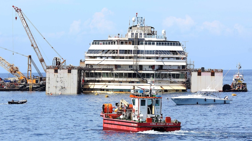 The wrecked cruise liner Costa Concordia is seen at Giglio harbour at Giglio Island