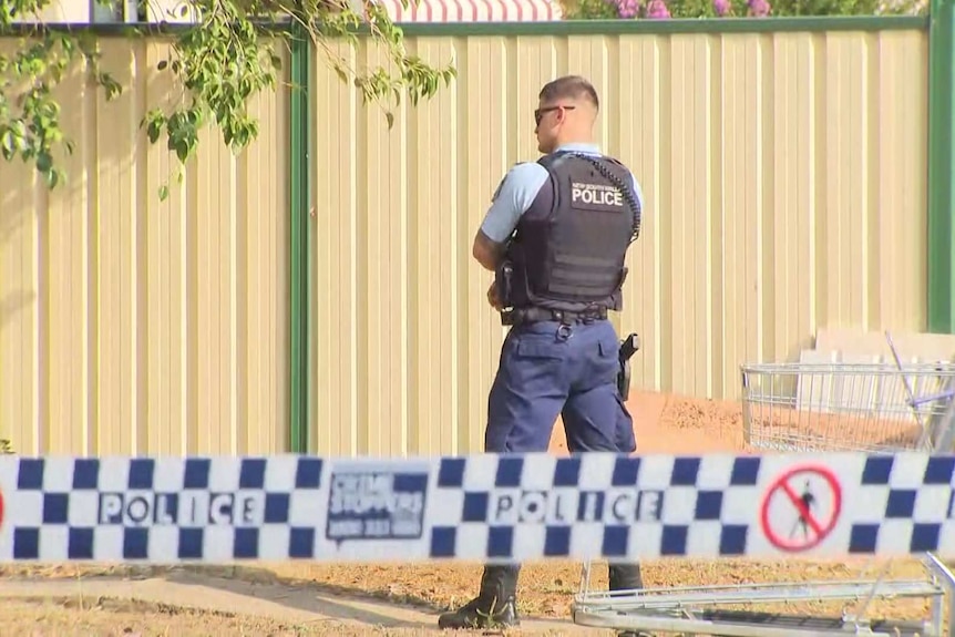 A police officer at a police line