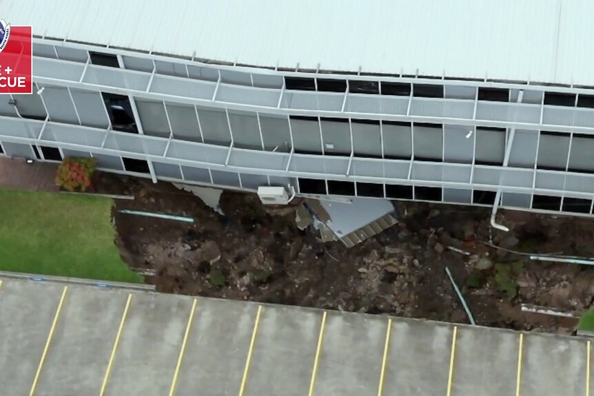 an aerial shot of a sinkhole under a commercial building in Rockdale