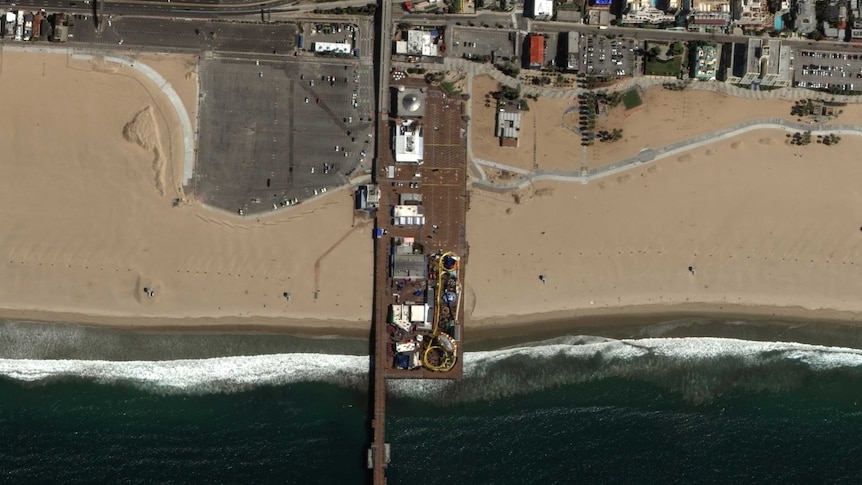 A satellite image of Santa Monica pier. It is deserted.