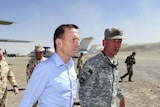 Mr Abbott made a flying weekend visit to Australian troops in Uruzgan province.