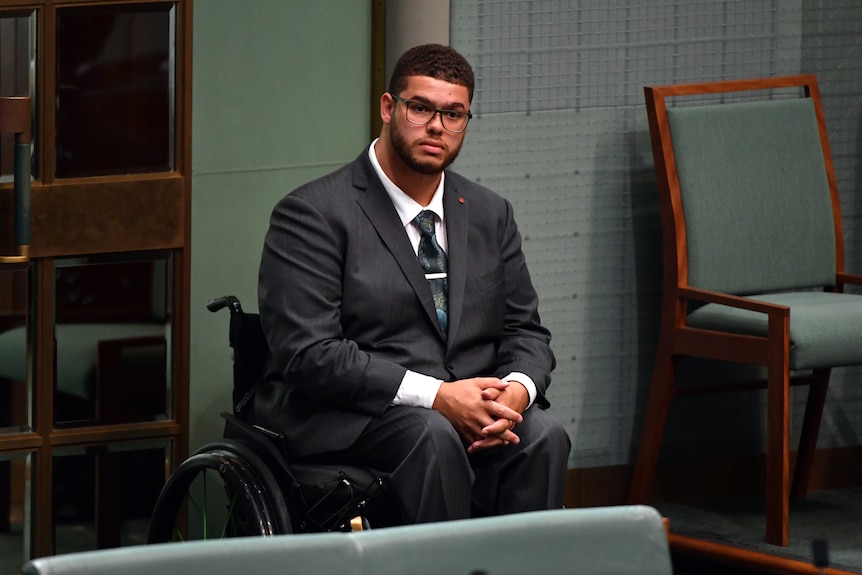 Jordon sits in his wheelchair in the House of Representatives.