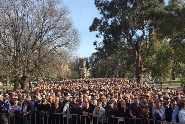 Huge queue of MCC members waiting to get into MCG