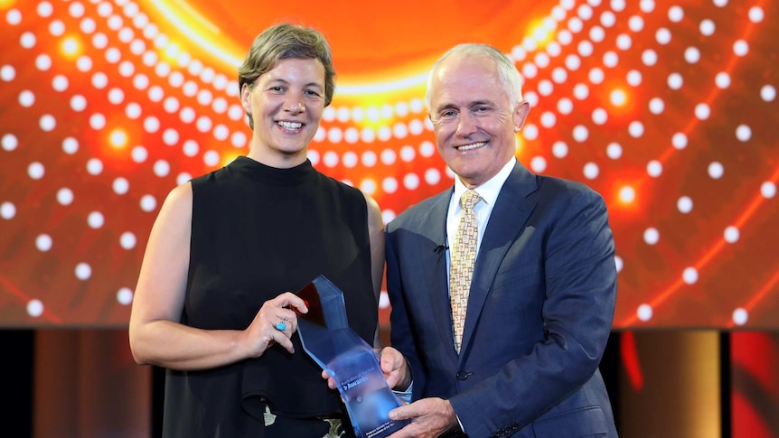 Michelle Yvonne Simmons stands with Prime Minister Malcolm Turnbull.