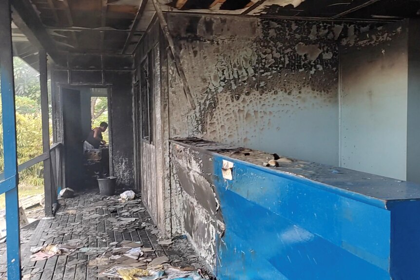 A general view of a burnt police station, after it was damaged during protests against the government in Honiara