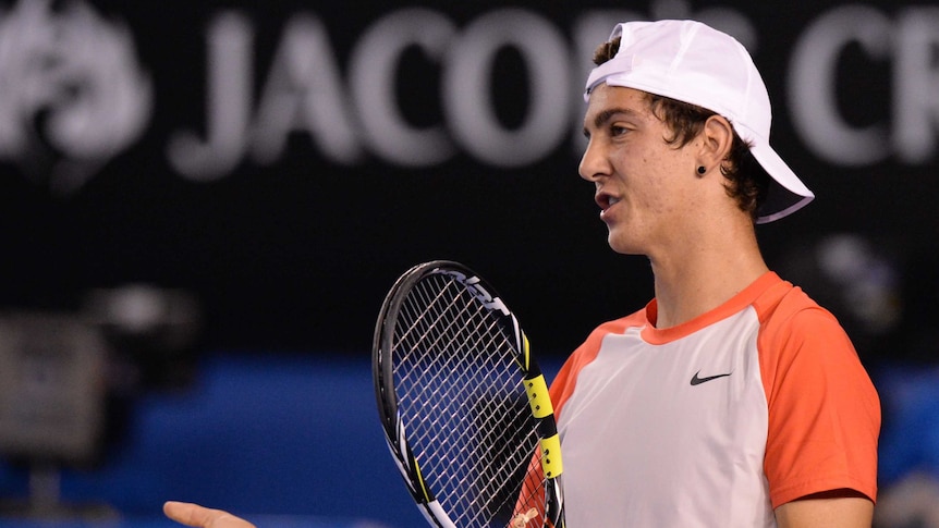 Nothing to lose ... Thanasi Kokkinakis gestures during his match against Rafael Nadal