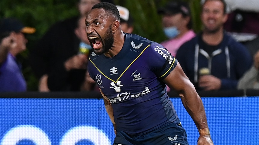 A Melbourne Storm NRL players screams as he celebrates a try against Manly.
