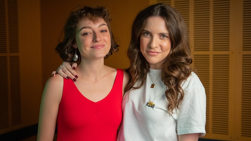 Stella Donnelly and Lucy Smith posing at triple j studios