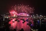 Boats by Sydney harbour overlooking the fireworks display for New Years.