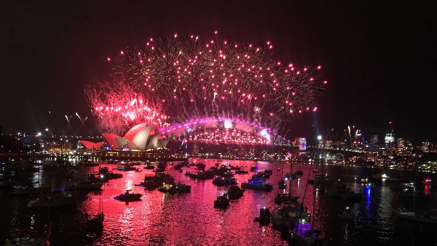 Boats by Sydney harbour overlooking the fireworks display for New Years.