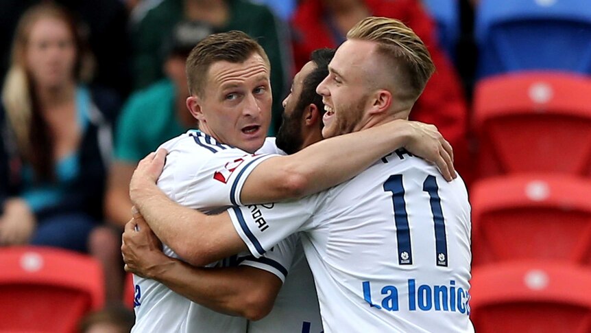 Besart Berisha and Connor Pain of the Victory celebrate a goal