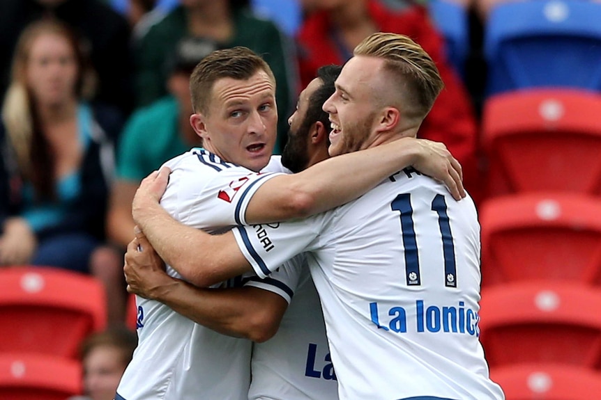 Besart Berisha and Connor Pain of the Victory celebrate a goal