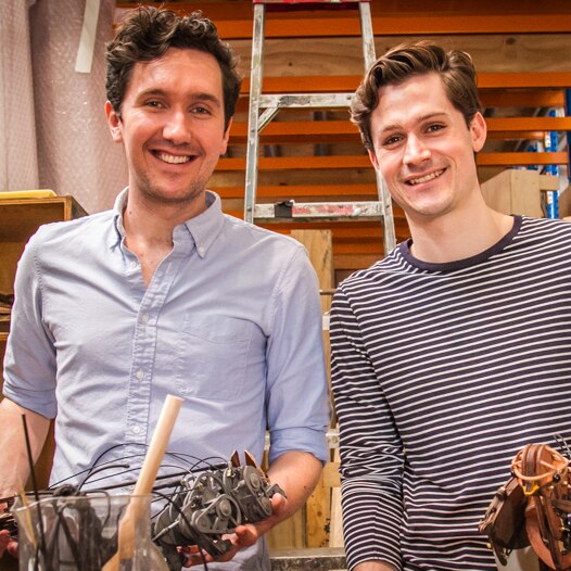 David Moreton and Nicholas Paine from the Dead Puppet Society hold two puppets constructed for The Wider Earth